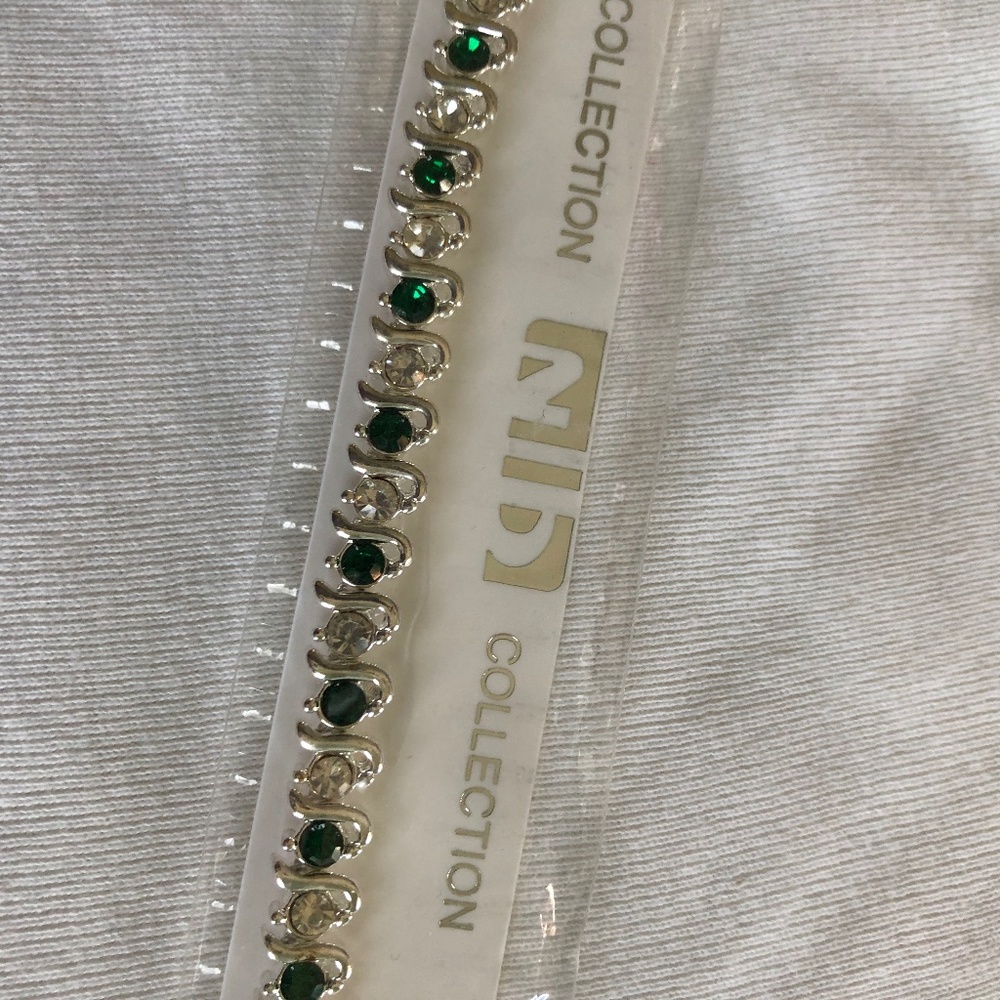 silvertone and emerald tennis bracelet